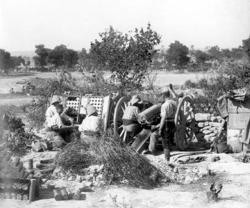 A French Colonial 75 mm artillery gun in action near Sedd el Bahr at Cape Helles, Gallipoli during the Third Battle of Krithia, 4 June 1915