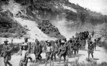 Turkish prisoners being marched to an internment camp at Cape Helles